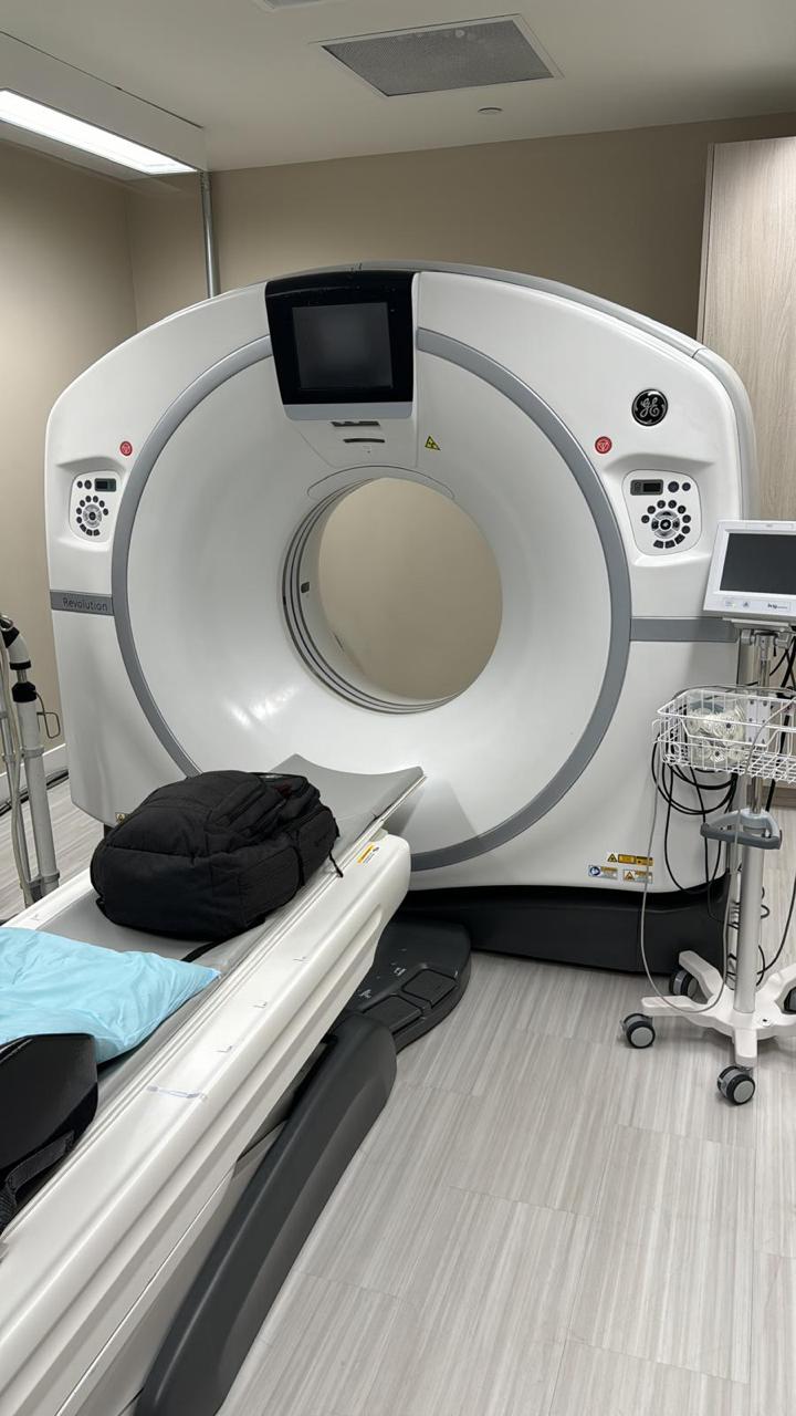 GE Revolution EVO CT scanner listing photo for manufacturer comparison.